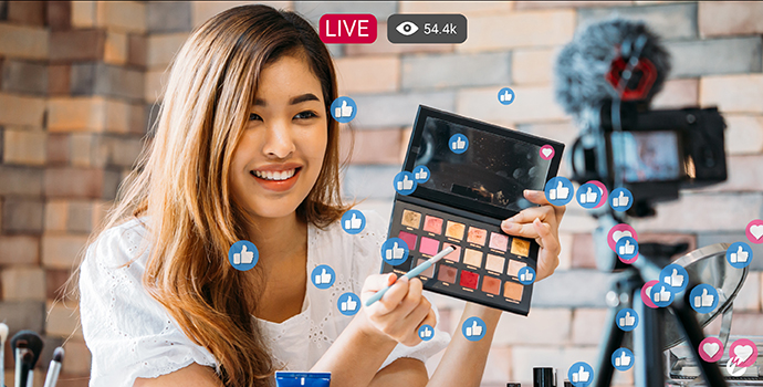 Social media live stream with influencer demoing makeup