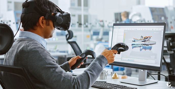 A man using a VR headset in an office setting to create a computer-assisted drawing.