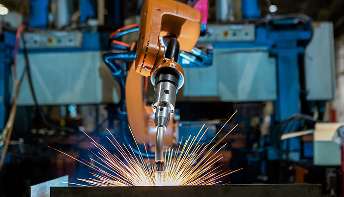 Close-up of remote-operated welding machinery