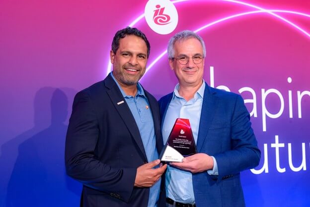 Wowza CEO Krish Kumar accepting the IBC Innovation Award for work done on the ACLU Mobile Justice app with Jason Van Anden from Quadrant II.