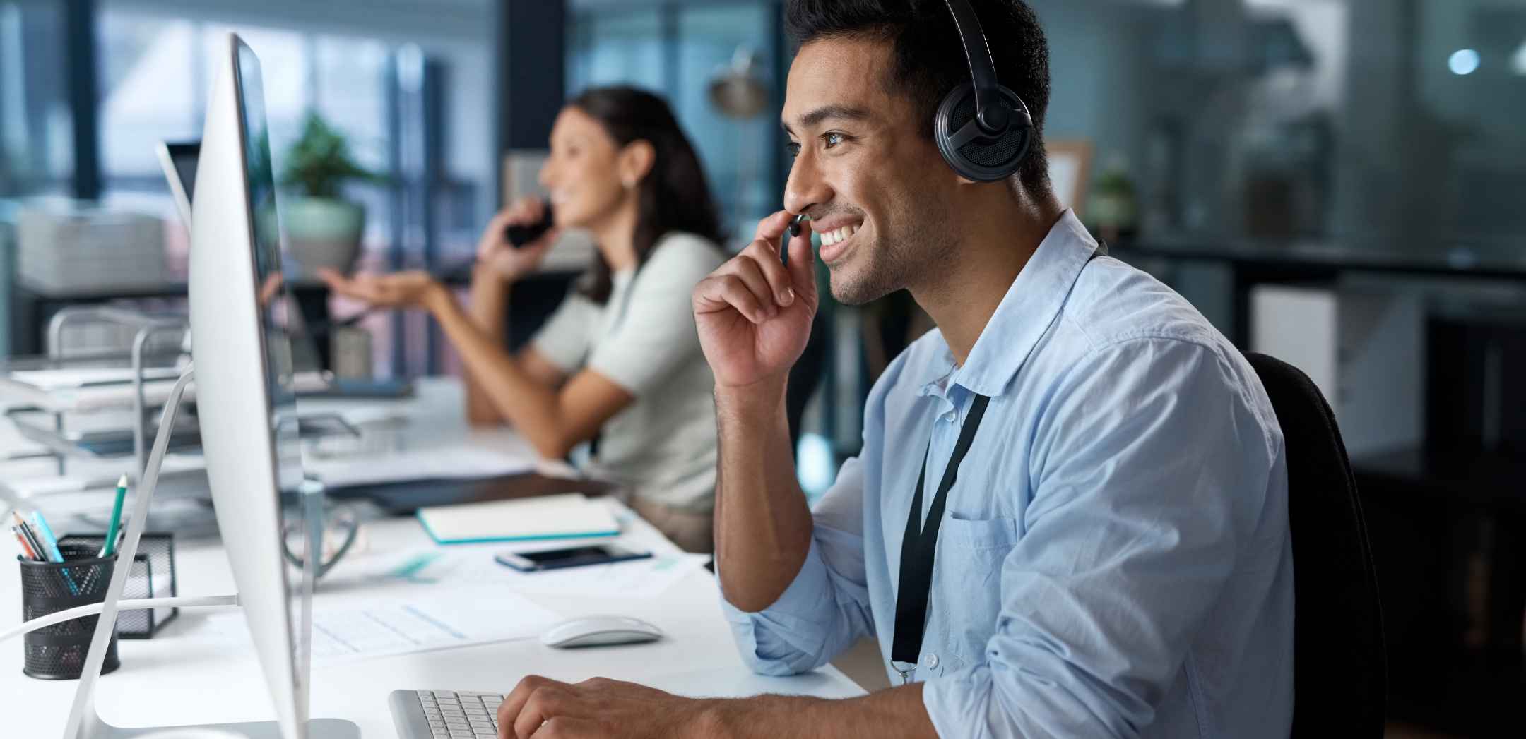 Support staff at computer workstation